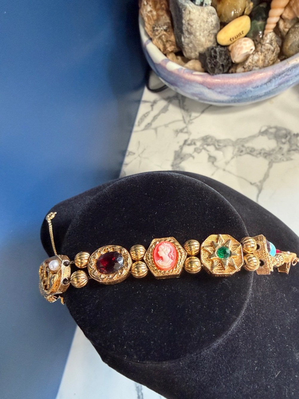 Gold-Tone signed vintage Goldette slide bracelet. 7.5 inches with safety chain.